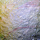 Image for article titled Cassini Spies "Unusual" Red Arcs on Saturn's Icy Moon Tethys